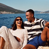 woman laughing with boyfriend in speedboat - travel stock pictures, royalty-free photos & images