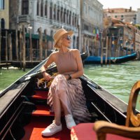 woman on a gondola tour sailing in grand canal in venice, italy - travel stock pictures, royalty-free photos & images