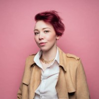 woman on pink background wearing leather jacket - fashion stock pictures, royalty-free photos & images