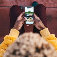 woman ordering food by delivery mobile app - food stock pictures, royalty-free photos & images