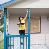 woman painting porch of house - home decoration stock pictures, royalty-free photos & images