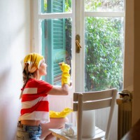 woman painting window frames - home decoration stock pictures, royalty-free photos & images