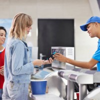 woman paying for snacks at concession stand - junk food stock pictures, royalty-free photos & images