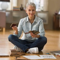 woman picking floor paneling - home decoration stock pictures, royalty-free photos & images