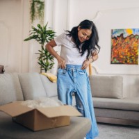 woman received a package at home - fashion stock pictures, royalty-free photos & images