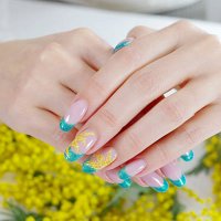 woman's hands with floral nail art design - nails art stock pictures, royalty-free photos & images