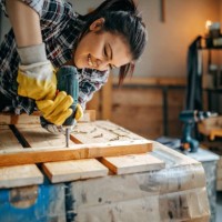 woman screwing with drill - home decoration stock pictures, royalty-free photos & images