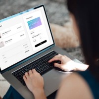 woman shopping clothes online on laptop and making payment with credit card - fashion stock pictures, royalty-free photos & images