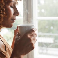 woman smelling coffee - coffee stock pictures, royalty-free photos & images