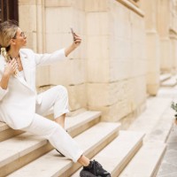 woman taking selfie on staircase - fashion stock pictures, royalty-free photos & images