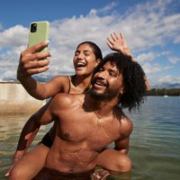 woman taking selfie with friend during vacation - travel stock pictures, royalty-free photos & images
