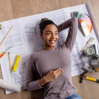 woman thinking about a furniture design for a house project - home decoration stock pictures, royalty-free photos & images