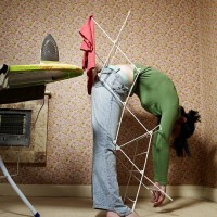 woman trapped in airer - home decoration stock pictures, royalty-free photos & images