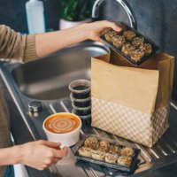 woman unpacking takeaway food delivery - junk food stock pictures, royalty-free photos & images