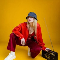 woman wearing 80s hip hop style outfit - fashion stock pictures, royalty-free photos & images