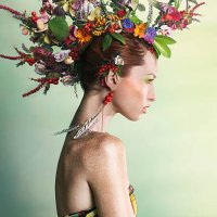 woman wearing a colorful floral mohawk - hairstyle stock pictures, royalty-free photos & images