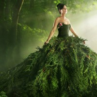 woman wearing a large green gown in the forest - fashion stock pictures, royalty-free photos & images