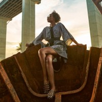 woman wearing dress and sitting on rusty ship wreck - fashion stock pictures, royalty-free photos & images