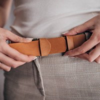 woman wearing modern leather belt - fashion stock pictures, royalty-free photos & images