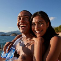 woman with boyfriend holding snorkel and scuba mask - travel stock pictures, royalty-free photos & images