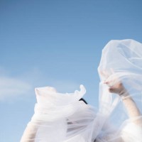 woman with white veil blowing over face - fashion stock pictures, royalty-free photos & images