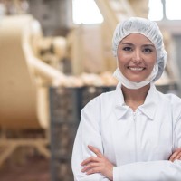 woman working at a food factory - food stock pictures, royalty-free photos & images