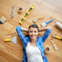 woman working on a housing project - home decoration stock pictures, royalty-free photos & images