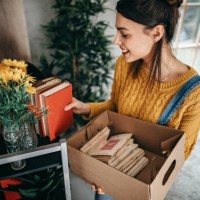 women arranging stuff in new apartment - home decoration stock pictures, royalty-free photos & images