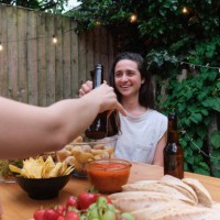 women cheering with beers at backyard party - garden decoration photos et images de collection