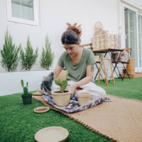 women planting tree. - garden decoration stock pictures, royalty-free photos & images