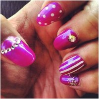 women's fingernails with nail art - nails art stock pictures, royalty-free photos & images
