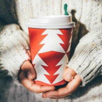 women's hands in a cozy sweater holding a cup of coffee to go. - junk food stock pictures, royalty-free photos & images