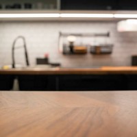 wood table top on blur kitchen counter (room)background. - food stock pictures, royalty-free photos & images