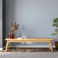 wooden bench with a book ,dried flowers and empty wall - home decoration stockfoto's en -beelden