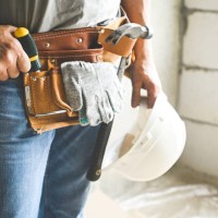 worker doing renovations in an apartment - home decoration stock pictures, royalty-free photos & images