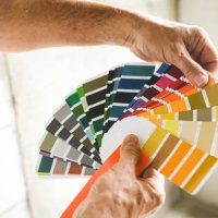 worker doing renovations in an apartment, color swatch, - home decoration stock pictures, royalty-free photos & images