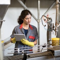 worker woman with tablet revise conveyor belt machine in food factory - food stock pictures, royalty-free photos & images
