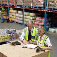 workers in a food distribution warehouse - food fotografías e imágenes de stock