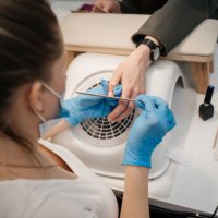 workflow of a pregnant woman manicure master - nails art stock pictures, royalty-free photos & images