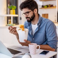 working from home - junk food stock pictures, royalty-free photos & images