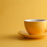 yellow coffee cup on a yellow background - coffee stock pictures, royalty-free photos & images