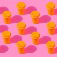yellow coffee cup pop art pattern on a pink background - junk food stock pictures, royalty-free photos & images