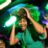 young afro american woman dancing and having fun at the disco with her friends - concert stock pictures, royalty-free photos & images