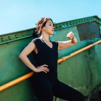 young asian female runner checking smart watch while taking a break - fashion stock pictures, royalty-free photos & images