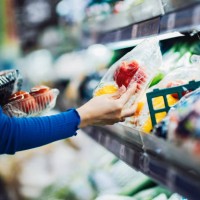 young asian woman shopping for fresh organic groceries in supermarket - food stock pictures, royalty-free photos & images