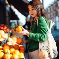 young asian woman shopping fresh fruits and vegetables at organic food market - food stock pictures, royalty-free photos & images