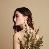 young beautiful girl and plant - fashion stock pictures, royalty-free photos & images