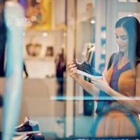 young beautiful girl is looking shoes in the mall - fashion stock pictures, royalty-free photos & images