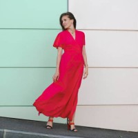 young beautiful woman in pink long dress walking on the street - fashion stock pictures, royalty-free photos & images