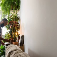 young black man listening to vinyl music at home - garden decoration stock pictures, royalty-free photos & images